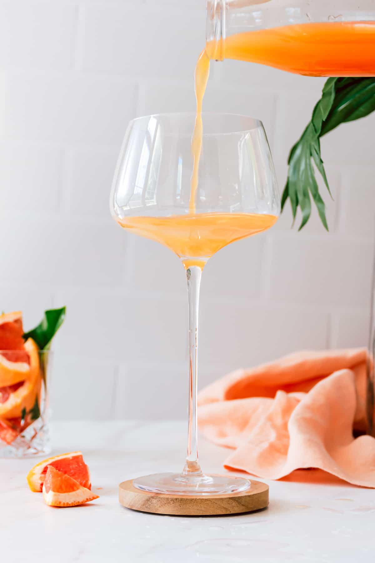 pouring grapefruit juice